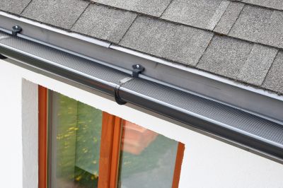 Before and After Gutter Cover Installation